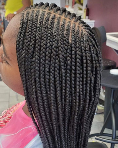 African Corn rows braid hairstylist